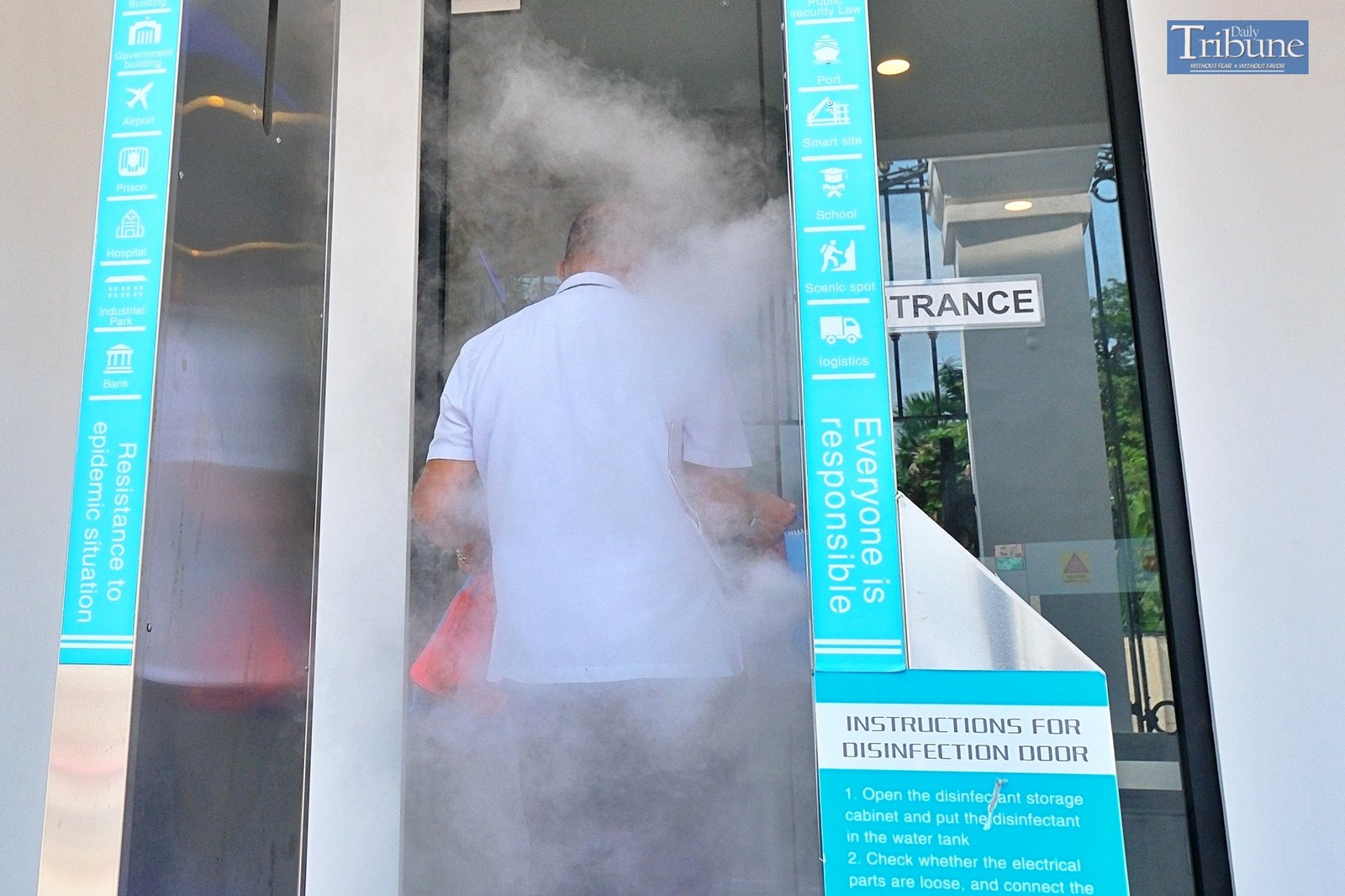 TRIBUNE-coviddisinfectiondoor